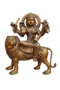 Brass Maa Durga idol seated on lion (Sherawali Mata), handcrafted Hindu goddess statue for home temple and spiritual decor